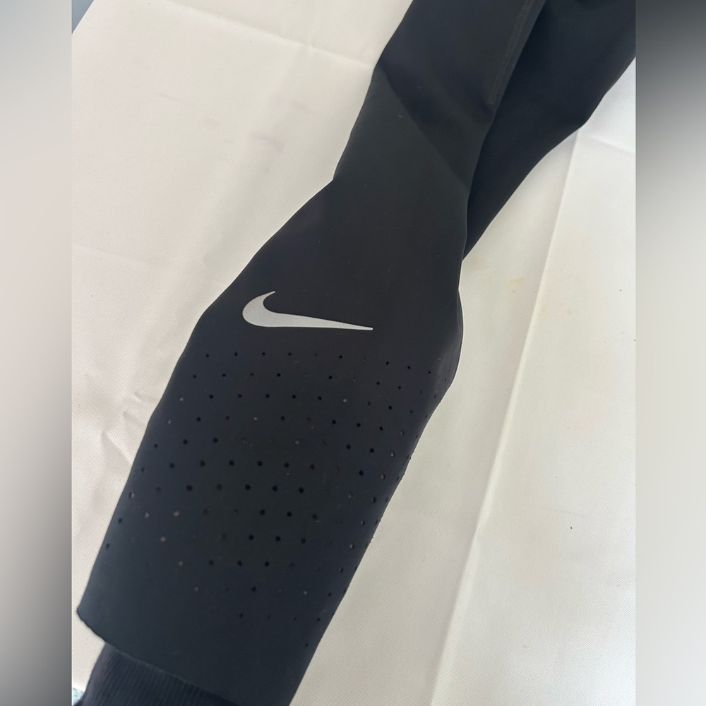 Nike | Dri-FIT Medium-Support High-Rise Cropped Leggings – Size Medium, Black